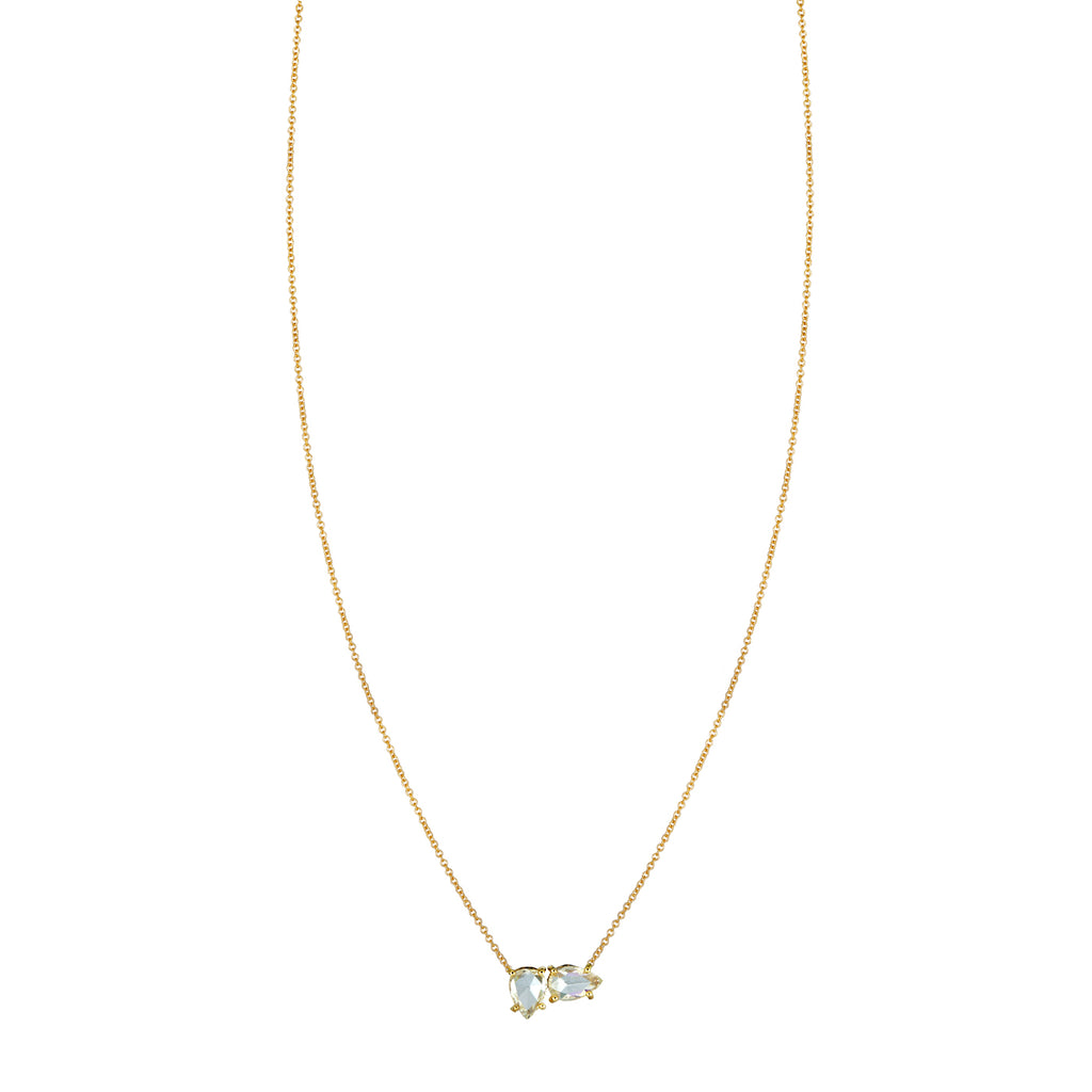 Front of Rose Cut Directional Diamond Necklace with two pear-shaped diamonds pointing in four directions